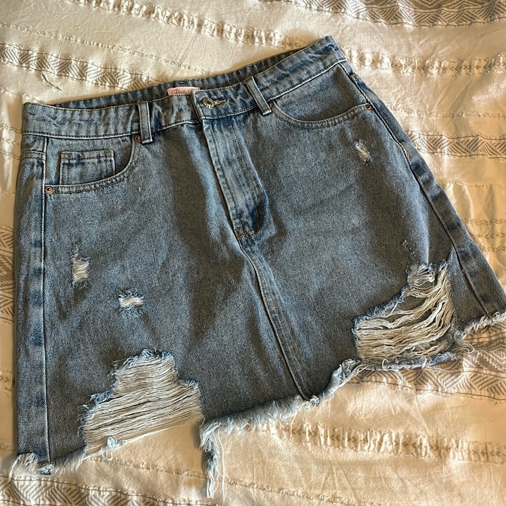 Distressed denim skirt